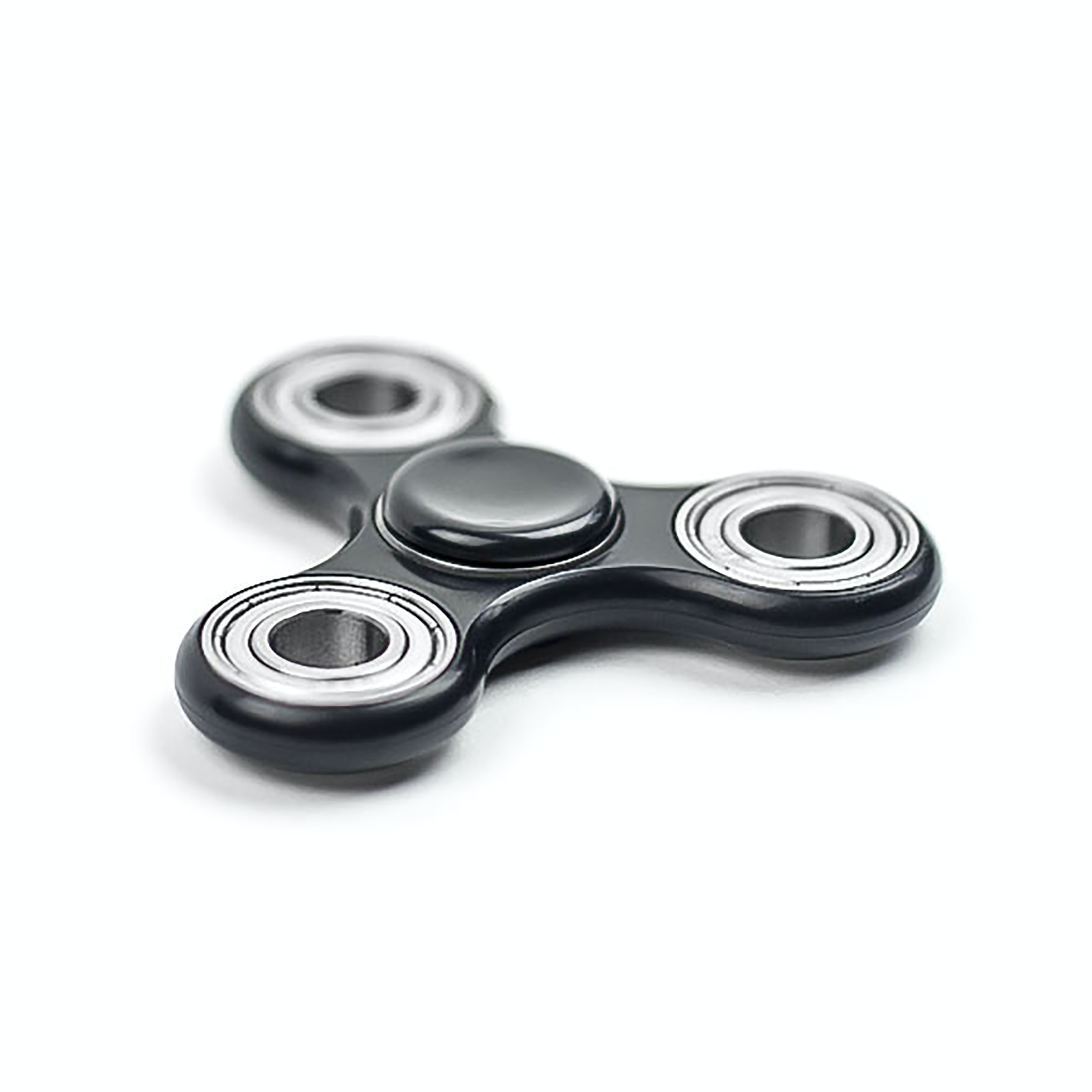 A photo of a black fidget spinner toy.