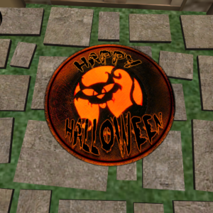 An image taken in Second Life showing a welcome mat that reads "Happy Halloween"