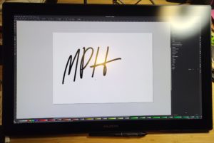 A color photo of Inkscape software being displayed on a Huion Kamvas Pro 24 4K computer graphics tablet.